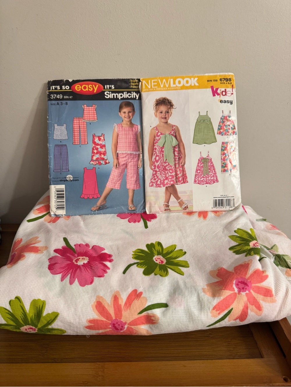 Several yards of fabric for sewing 2 girls patterns for dress and pants homemade